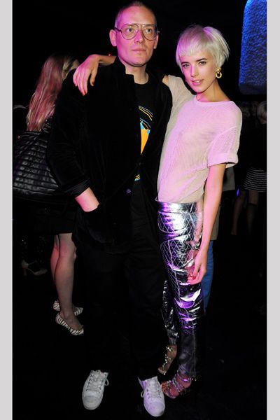<p>Agy hung out with best mate and the capital's catwalk King, Giles Deacon, at the after-party for his show</p>