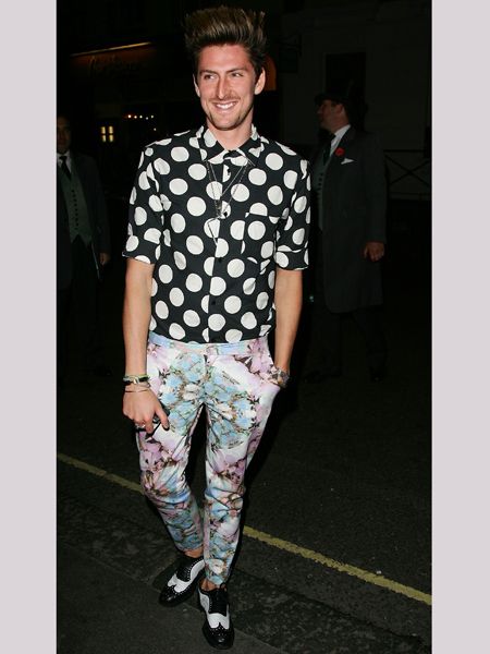 Designer of the moment shows off his eclectic fashion edge with a mismatch of florals and spots - luckily for him, Henry can pull this gear off.  <br />