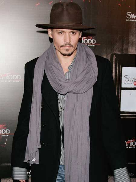 Mr Depp frames those chiselled features with a hat and slouchy scarf - are you tempted?  <br />