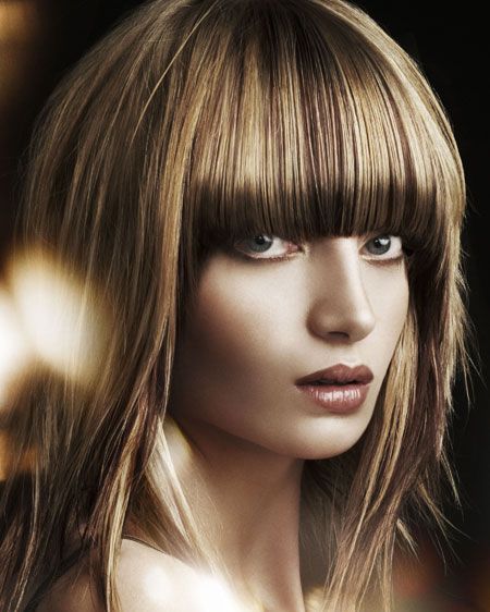 <p> </p><p>Blonde and ruby brown panels of colour create a burnished topaz effect that showcases the shape of the cut perfectly.<br /><br />Left: Rae Palmer at Rae Palmer Hairdressing, Southsea, Hants, for Schwarzkopf. Tel: 023 9242 6622  <br />  </p>