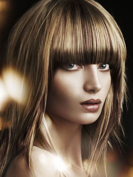 <p> </p><p>Blonde and ruby brown panels of colour create a burnished topaz effect that showcases the shape of the cut perfectly.<br /><br />Left: Rae Palmer at Rae Palmer Hairdressing, Southsea, Hants, for Schwarzkopf. Tel: 023 9242 6622  <br />  </p>
