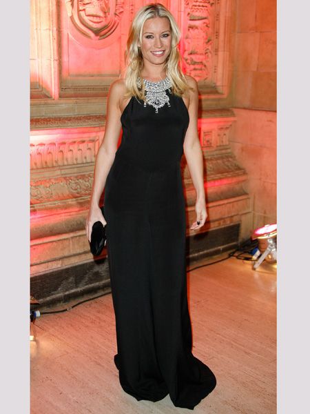 Denise went for an on-trend gothic inspired look with this trailing floaty black gown, sexed-up with an embellished neck line. Do you love her new look or should she stick to showing off her pins?  <br />