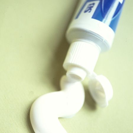 If you're fake tanning, a failsafe way to remove any mistakes is with a whitening toothpaste.  <br />