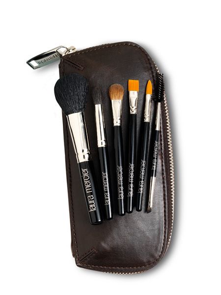 For touch-ups and travelling, this bag of baby brushes will suit the beauty guru's every need and take her from meetings to martinis in a fabulous flash. Inside the pint-sized pouch is a cheek colour brush, secret camouflage brush, angled and corner eye brushes that will create a flawless look. <br /><br />Available from <a target="_blank" href="http://www.spacenk.co.uk ">www.spacenk.co.uk </a><br /><br />