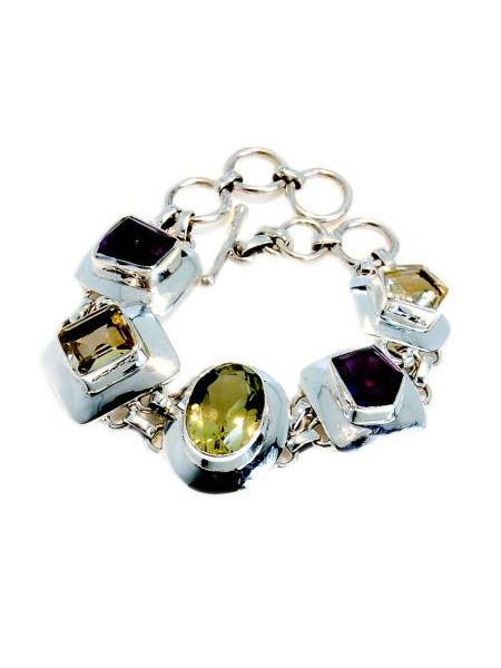 Get the style-savvy something that sparkles with this bling-tastic sterling silver bracelet. The handmade piece combines colourful Citrine and Amethyst with Lemon Quartz, all encased in silver. Available at <a target="_blank" href="http://www.colouredrocks.com/">www.colouredrocks.com  </a><br />
