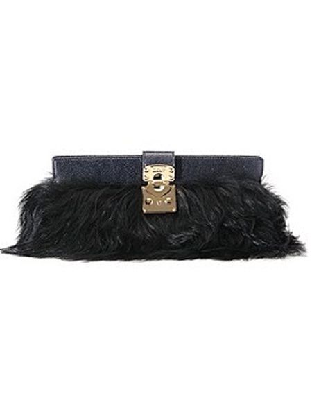 Fabrics with fringing and feathers will be on every fashionista's wish list, so treat her to this long-haired faux fur clutch and she'll be in accessory heaven. The clutch from <a target="_blank" href="http://www.harrods.com">www.harrods.com</a> is finished with a glossy patent leather and golden clasp - perfect for parading with a knockout dress.  <br />