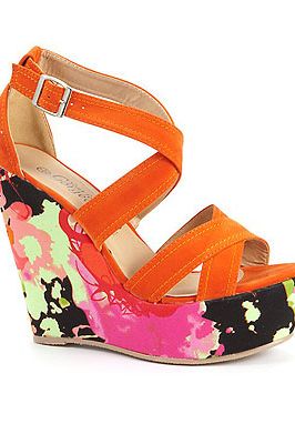 <p>The higher the better where shoes are concerned and these colourful wedges are just what we need to stand out from the crowd in Ibiza!</p>
<p>Floral print heel wedges, £24.99, <a href="http://www.newlook.com/shop/shoe-gallery/view-all-shoes/bright-orange-floral-print-heel-wedges_246242782">New Look</a></p>