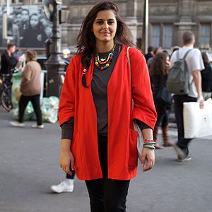 <p><em>Jewellery designer</em></p>
<p>We couldn't take our eyes off of Sara Harakat's red vintage coat from Le Marais at Paris Fashion Week. She completed this hip look with trousers from Uniqlo and Marc Jacob shoes and jewellery she made herself. We love this combo!</p>