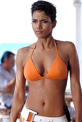 <p>How can we forget Halle Berry emerging out of the water in that fabulous orange bikini as Jinx Johnson in Die Another Day? She heats things up with Pierce Brosnan as another sexed-up Bond girl!</p>
<p><strong>Top secret tip</strong>: <a href="http://www.boots.com/en/Black-and-White-Pluko-Hair-Dressing-Pomade-50ml_873139/?CAWELAID=334511675&cm_mmc=Shopping%20Engines-_-Google%20Base-_---_-div%20classeditContentAreaBlack%20and%20White%20Pluko%20Hair%20Dressing%20Pomade%2050mldiv" target="_blank">Black and White Pluko Hair Dressing Pomade</a> is the perfect weapon for sculpting shorter hair into this spikey style.</p>