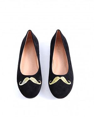 <p>Although we may all disagree on whether men should sport moustaches (like, ever), we can at least agree that girls look just as great with this Movember stamp. This is definitely our favourite pick.</p>
<p>Tierra Moustache Pump, £19.99, <a href="http://www.missguided.co.uk/catalog/product/view/id/50265/s/tierra-moustache-pumps/category/641/" target="_blank">Missguided</a></p>