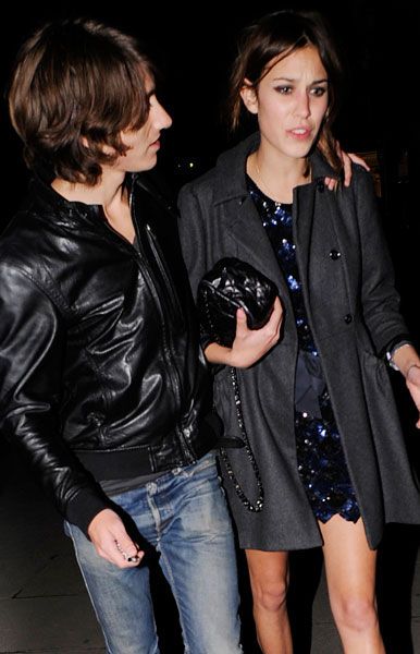 Arctic Monkey Alex Turner and his TV presenter girlfriend Alexa Chung were seen leaving the Universal after show party for the Brits having something of a lover's tiff. Alexa looked visibly upset while Alex tried to comfort her.