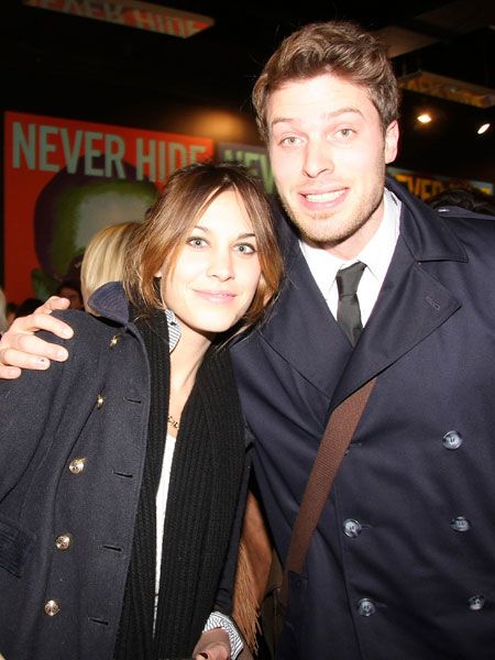 T4 presenters Alexa Chung and the gorgeous Rick Edwards posed happily for photographers at the launch of Ray-Ban Colorize at Selfridges. And who wouldn't, being that effortlessly beautiful...  <br />