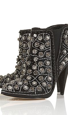 <p>WOWSERS. These are what we call pimped-up kicks. Bring some bling into your life with these Balmain-inspired boots - perfect for amping up trousers if you're a dress-phobic at party season.</p>
<p>AVANT embellished boots, £120, <a title="http://www.topshop.com/webapp/wcs/stores/servlet/ProductDisplay?beginIndex=1&viewAllFlag=&catalogId=33057&storeId=12556&productId=8176052&langId=-1&sort_field=Relevance&categoryId=277012&parent_categoryId=208491&pageSize=200&siteID=TnL5HPStwNw-sqBgDJF_PEeSe1N4sOZztw&cmpid=ukls_deeplink&_$ja=tsid:19906|prd:TnL5HPStwNw " href="http://www.topshop.com/webapp/wcs/stores/servlet/ProductDisplay?beginIndex=1&viewAllFlag=&catalogId=33057&storeId=12556&productId=8176052&langId=-1&sort_field=Relevance&categoryId=277012&parent_categoryId=208491&pageSize=200&siteID=TnL5HPStwNw-sqBgDJF_PEeSe1N4sOZztw&cmpid=ukls_deeplink&_$ja=tsid:19906|prd:TnL5HPStwNw%20" target="_blank">Topshop</a><br /><br /></p>