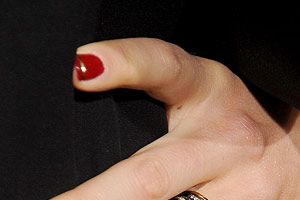 <p>Actress Jessica Biel was feeling festive at the Hitchcock film premiere in LA. She showed up wearing super shiny red nails with a gold stripe. We thought this classic minimal nail art was a sweet twist from the conventional French manicure. The newly-wed must be super excited to spend her first Christmas as Justin Timberlake's wife. Check out the stone on that bling. Wow!</p>