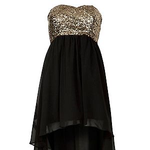 <p>Sequins automatically get us in the Christmas spirit. This mullet hemline is still a massive trend.<br /> <br /> Gold and black dress, £29.99, <a href="http://www.newlook.com/shop/womens/dresses/parisian-gold-sequin-black-dip-hem-dress_272797201%20%20" target="_blank">New Look</a> </p>