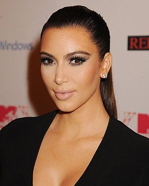 <p>Kim Kardashian's sexy ponytail is so hot this season, and it's easy to maintain. Spray a soft bristle brush with <a href="http://www.boots.com/en/Tresemme-Superior-Hold-Touchable-Feel-hairspray_1106547/" target="_blank">TRESemm<span class="st">é</span> Superior Hold Hairspray</a>, comb through and tie your hair up tightly with an elastic.</p>
<p>"Once hair is tied back with a soft brush or comb repeat brushing hair from the face back to the pony tail to get rid of any looser areas," says Matthew Curtis, TRESemm<span class="st">é</span> UK lead stylist. "Take a small section of hair out the ponytail and wrap around the hair band, pinning it in place to give it a finished look and to hide the hair band."</p>
<p>Finish with <a href="http://www.boots.com/en/TRESemme-Smooth-glossing-spray-75ml_1222316/" target="_blank">TRESemm<span class="st">é</span> Smooth Glossing Spray</a> to give is that glamourous, glossy and expensive feel.</p>