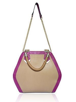 <p>With the catwalks abuzz with hexagonal shapes, the Eastcote bag is a quirky shaped, colour block, grab bag sure to start your spring with a style statement!</p>
<p>LYDC Eastcote Bag, £38, <a href="http://www.brandvillage.co.uk/products/The-Eastcote-Bag-%252d-LYDC-Khaki-Hexagonal-Grab-Bag.html%20" target="_blank">Brand Village </a></p>