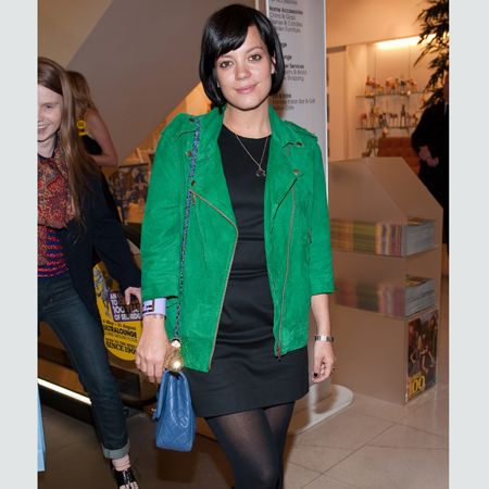 From chav chic to sophisticated style Lily Allen has grown up and got glamorous! Forget the full frocks and flat footwear of her debut days, along with her record sales, the songstress' style and sexiness has soared and she couldn't look better. <em>Cosmo</em> had no choice but to honour her recent revamp...<br /><br />Left: Lily gets the block bright trend spot on with a green suede biker jacket and blue Chanel handbag which brighten up her little black dress and YSL Trib Two platforms<br /><br />