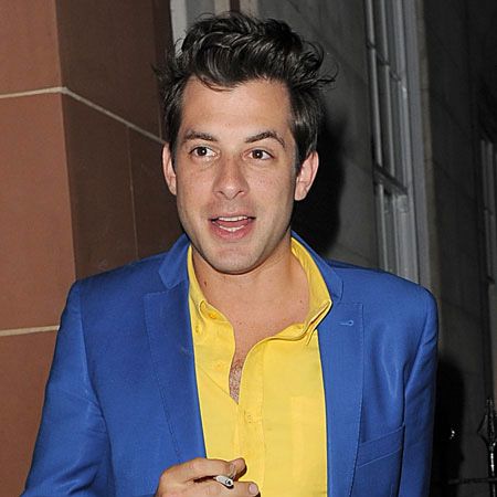 An effortlessly cool Mark Ronson was caught sneaking out for a crafty cigarette during a night of cocktails at London's exclusive Cipriani...  <br />