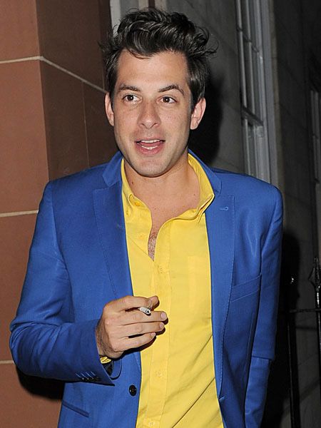 An effortlessly cool Mark Ronson was caught sneaking out for a crafty cigarette during a night of cocktails at London's exclusive Cipriani...  <br />