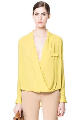 <p>Yellow was everywhere at London Fashion Week, from Rihanna for River Island to Jonathan Saunders. If you're not up for neon yellow, go for pale with this super-feminine draped blouse from Zara with just the right amount of cleavage.</p>
<p>Blouse, £29.99, <a href="http://www.zara.com/webapp/wcs/stores/servlet/product/uk/en/zara-neu-S2013/363008/1121143/DRAPED%20BLOUSE" target="_blank">Zara</a></p>