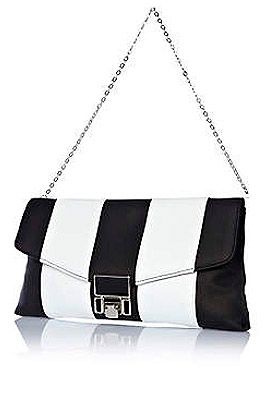 <p>No need to choose! This arm candy from River Island combines both. We love the futuristic look with the stripes and square lock - the monochrome accessory you need.<br /><br />Mono stripe bag, £18, <a href="http://www.riverisland.com/women/bags--purses/clutch-bags/Black-and-white-stripe-flip-lock-clutch-bag-632750%20" target="_blank">River Island</a></p>