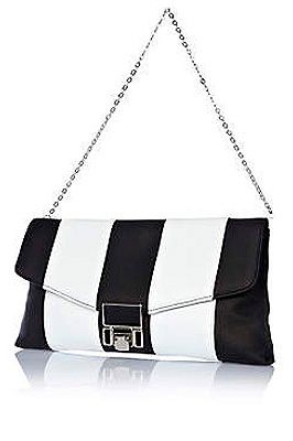 <p>No need to choose! This arm candy from River Island combines both. We love the futuristic look with the stripes and square lock - the monochrome accessory you need.<br /><br />Mono stripe bag, £18, <a href="http://www.riverisland.com/women/bags--purses/clutch-bags/Black-and-white-stripe-flip-lock-clutch-bag-632750%20" target="_blank">River Island</a></p>
