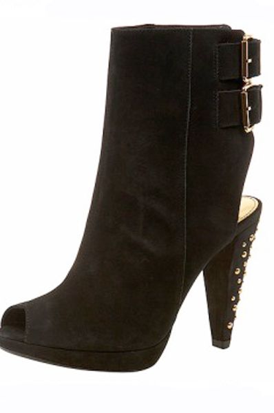 Black studded boots, £90,  <a target="_blank" href="http://www.topshop.com/webapp/wcs/stores/servlet/ProductDisplay?beginIndex=0&viewAllFlag=&catalogId=19551&storeId=12556&categoryId=73929&parent_category_rn=42358&productId=1248350&langId=-1&intcmpid=FEATURE_IP_UK_WK42_STUDDED_BOOT">Topshop</a> - I love these! Worn bare legged in summer and then ready for tights in winter. You can always justify buying boots in summer if they look this gorgeous!  <br />