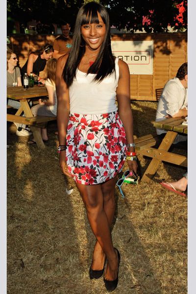The singer strutted her stuff in a floral skirt and white tee but made a festival faux pas by wearing heels in a field. But she still caught the eye of Kanye West who invited her to his dressing room  <br />