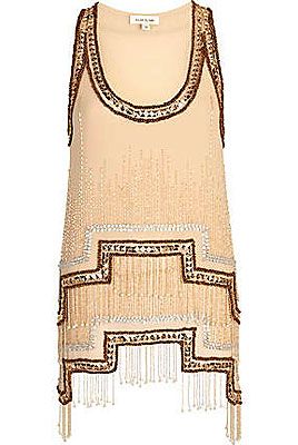<p>You'll be a deco dream in this little number! With a stepped hem, hanging beads and heavy embellishment, this decadent tank top is the modern way to inject some flapper fun into your going out look.</p>
<p>Stepped hem embellished tank top, £50, <a title="River Island" href="http://www.riverisland.com/women/tops/going-out-tops/Bronze-stepped-hem-embellished-tank-top-632542" target="_blank">River Island</a></p>