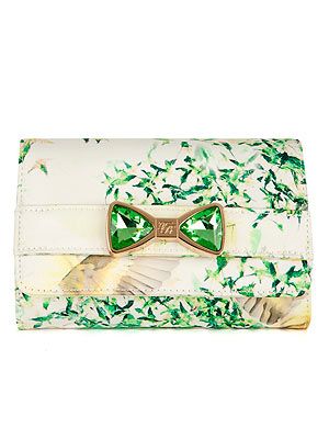 <p>This Ted Baker bag, complete with floral print and emerald crystal bow, is almost too pretty for words.</p>
<p>Clutch, £79, <a href="http://www.tedbaker.com/women%27s/women%27s_accessories/bags/list.aspx#page=2&styCode=105519&colRef=39-LIGHT%20GREEN&path=/women's/women's%20accessories/bags/" target="_blank">Ted Baker</a></p>