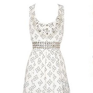 Great for day and even better for night dressed up with heels or gorgeous gladiators, it's a summer essential.<br /><br />£55, <a target="_blank" href="http://www.oasis-stores.com/fcp/product/Oasis//Studded-dress/3770009102?colour=white">www.oasis-stores.com</a><br />