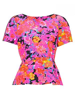 <p>If you want to stand out from the crowd this floral pink and orange top from Whistles is a sure bet, and the peplum shape is flattering to most shapes. What more could you want?</p>
<p>Top, £95, <a href="http://www.whistles.co.uk/fcp/categorylist/new/in?resetFilters=true#product=903000059974" target="_blank">Whistles</a></p>