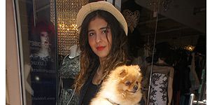 <p>We can't take our eyes away from Romeo, the cute Pomeranian dog - the pup has style! And so does his owner, Marshal Aattai. The chic French girl looked gorgeous in her Topshop printed trousers and hat combo.</p>