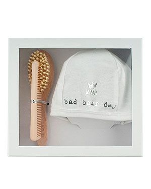 <p>Okay, their hair may be just wispy strands as this stage, but that doesn't mean it will do as it's told. This brush, comb and hat set from BamBam will make sure their tufts are kept neatly tucked in, even if baby isn't! Adorbs.</p>
<p>BamBam 'Bad Hair Day' Gift Box, £15.00, <a href="http://www.personalgiftshop.co.uk/bambam-giftbox-bad-hair-day.html" target="_blank">Personalgiftshop.co.uk</a></p>