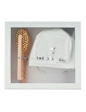 <p>Okay, their hair may be just wispy strands as this stage, but that doesn't mean it will do as it's told. This brush, comb and hat set from BamBam will make sure their tufts are kept neatly tucked in, even if baby isn't! Adorbs.</p>
<p>BamBam 'Bad Hair Day' Gift Box, £15.00, <a href="http://www.personalgiftshop.co.uk/bambam-giftbox-bad-hair-day.html" target="_blank">Personalgiftshop.co.uk</a></p>