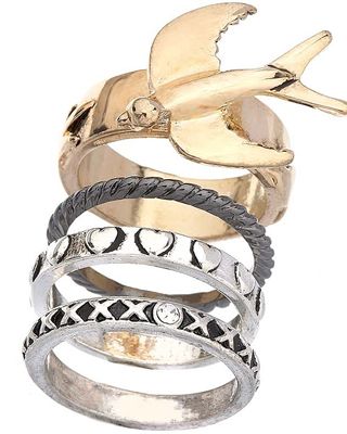 Rings are huge at the moment, think Phoebe in 'Friends' and stack on as many as you can, voila!<br /><br />£7, <a target="_blank" href="http://www.topshop.com/webapp/wcs/stores/servlet/ProductDisplay?beginIndex=0&viewAllFlag=true&catalogId=19551&storeId=12556&categoryId=59926&parent_category_rn=42317&productId=1351232&langId=-1">www.topshop.com</a><br /><br /><br /><br />