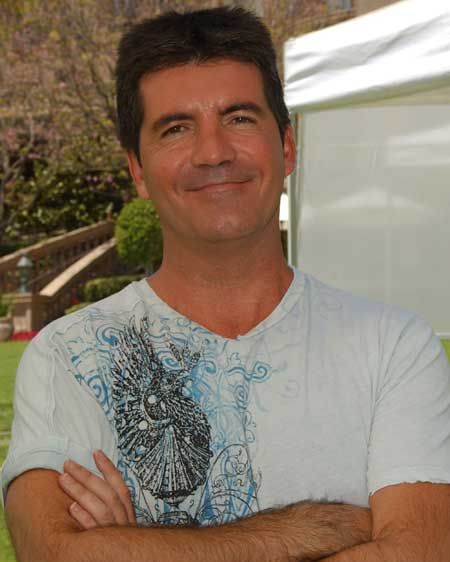 He's rude, arrogant, has oddly square hair and wears his trousers way too high. Which leaves us wondering, why is Simon Cowell our number one reason for tuning into <em>The X Factor</em>?  <br />