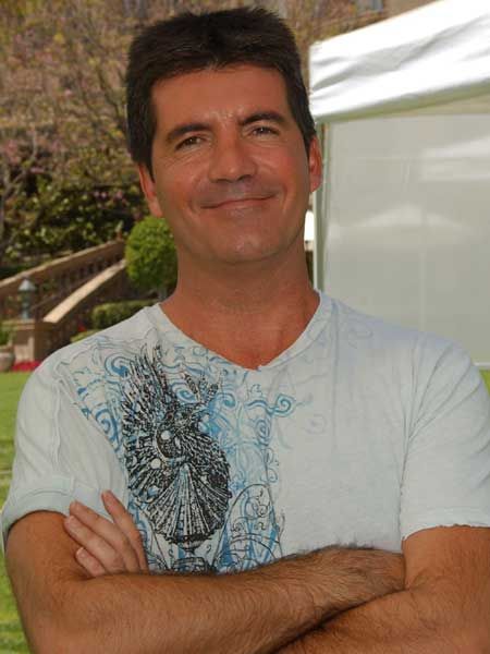 He's rude, arrogant, has oddly square hair and wears his trousers way too high. Which leaves us wondering, why is Simon Cowell our number one reason for tuning into <em>The X Factor</em>?  <br />