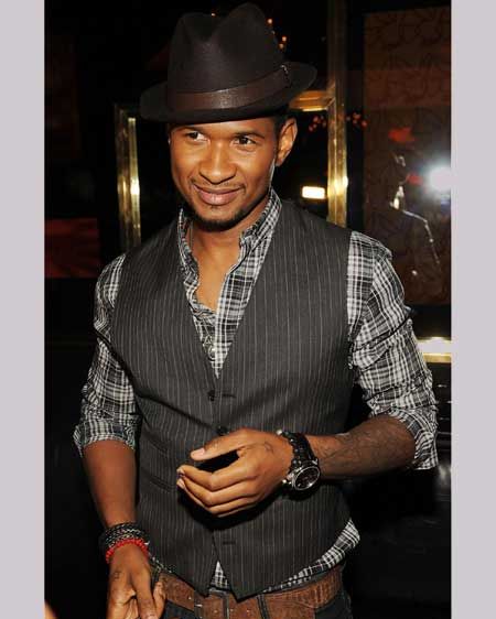 This sexpot is super slick when it comes to his dance moves and super snappy when it comes to his dress sense. Usher plays up to the old-school cool in a waistcoat and we like it a lot  <br />