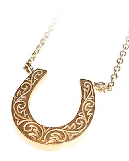 Bring yourself some luck with this gorgeous gold horseshoe charm necklace- prefect for a pressie... or yourself! <br /><br />£155, <a target="_blank" href="http://www.lauraleejewellery.com/boutique/index.php?_a=viewProd&productId=57">www.lauraleejewellery.com</a><br />