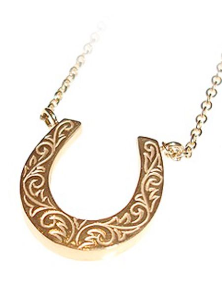 Bring yourself some luck with this gorgeous gold horseshoe charm necklace- prefect for a pressie... or yourself! <br /><br />£155, <a target="_blank" href="http://www.lauraleejewellery.com/boutique/index.php?_a=viewProd&productId=57">www.lauraleejewellery.com</a><br />