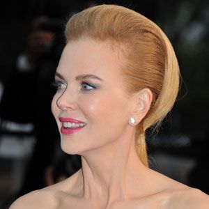 <p>This style looks stunning and is actually a really sophisticated style that would work for a wedding or on the red carpet. Nicole Kidman worked this look well even though she has naturally curly hair. It's a great look to wear if you are wearing a patterned outfit, you know the rules wear a statement outfit and keep your hair and makeup minimal.</p>
