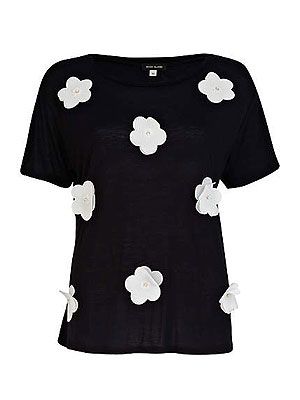 <p>SO of-the-moment, with a girly twist, this 3D flower t-shirt channels spring's monochrome trend. And guess what? It's only £15! (No, we can't believe it either..)</p>
<p>3D flower t-shirt, £15, <a title="River Island" href="http://www.riverisland.com/women/t-shirts--vests--sweats/plain-t-shirts--vests/Black-and-white-3D-flower-t-shirt-641271" target="_blank">River Island </a></p>