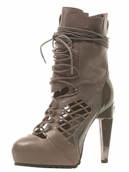 OMG- These are the most amazing boots I've ever seen! see you in the Topshop Queue!<br /><br /><br />£200, <a target="_blank" href="http://www.topshop.com/webapp/wcs/stores/servlet/ProductDisplay?beginIndex=0&viewAllFlag=&catalogId=19551&storeId=12556&categoryId=175036&parent_category_rn=175013&productId=1374845&langId=-1">www.topshop.com</a><br />  <br />