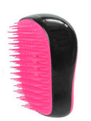 <p>This is the only way to tackle washed-up locks that resemble seaweed. With unique convex teeth, the Tangle Teezer makes detangling pain-free and prevents damage. This mini version will fit in your beach bag no problem.<br />Compact Tangle Teezer, £11.99, <a title="http://www.theukedit.com/tangle-teezer-compact-styler-black/pink/10304139.html" href="http://www.theukedit.com/tangle-teezer-compact-styler-black/pink/10304139.html" target="_self">Cosmo Boutique</a></p>