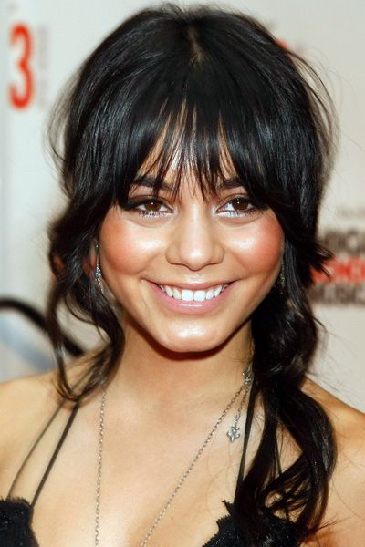 Adding a long, choppy fringe to her perfect hair portfolio, Vanessa's well-preened tresses stay put in this loose look  <br />