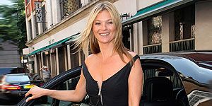 <p>Kate Moss was only meeting friends for lunch yesterday, but she certainly dressed up for the occasion. She arrived at The Ivy in a black Prada prom dress with sexy zip detail on the bodice, and jazzed it up with neon sandals and a zebra print clutch. Trust Kate to make a prom dress look sexy.</p>