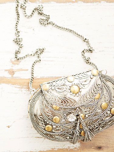 <p>A beautiful metal bag with intricate detailing, ideal for opulent evenings out or for adding a touch of luxe to denim and a tee.</p>
<p><a href="http://www.missselfridge.com/en/msuk/product/clothing-299047/inspired-by-2054440/inspired-by-metal-bag-2029511?bi=1&ps=40%20" target="_blank">INSPIRED BY METAL BAG</a>, £40 Miss Selfridge </p>
