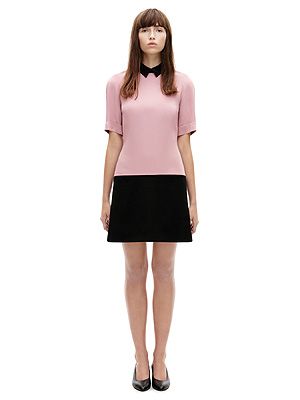 <p>A tunic dress in blossom and black with a contrasting collar.</p>
<p>Raglan contrast collar tunic, £495, <a title="Victoria, Victoria Beckham" href="http://www.victoriabeckham.com/shop/category/victoria-victoria-beckham/raglan-contrast-collar-tunic-blossom-slash-black" target="_blank">Victoria, Victoria Beckham</a></p>